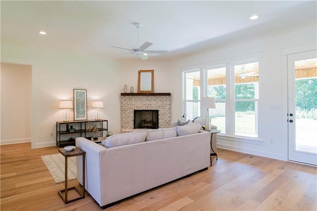 305 Hannah Chase Way, Satsuma, AL 36572 - living room with ceiling fan, light wood-style floors, baseboards, a fireplace, and recessed lighting