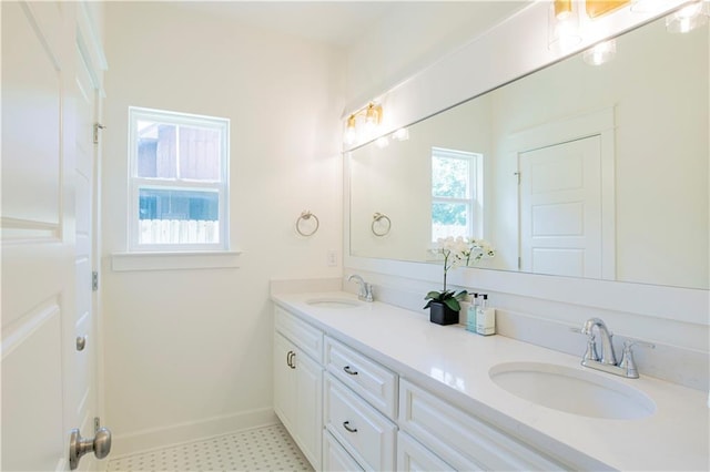 305 Hannah Chase Way, Satsuma, AL 36572 - bathroom with double vanity and baseboards