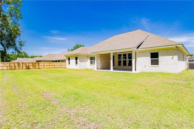 305 Hannah Chase Way, Satsuma, AL 36572 - rear view of house with a patio