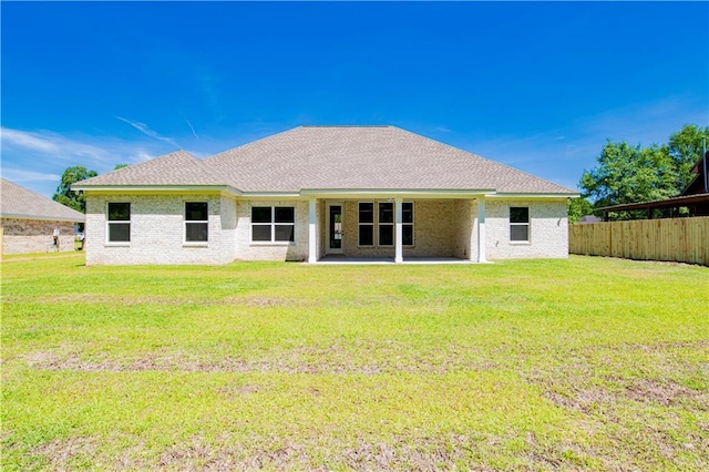 305 Hannah Chase Way, Satsuma, AL 36572 - rear view of property featuring a patio area, roof with shingles, and brick siding