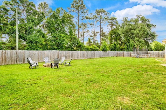 305 Hannah Chase Way, Satsuma, AL 36572 - view of yard with a fire pit