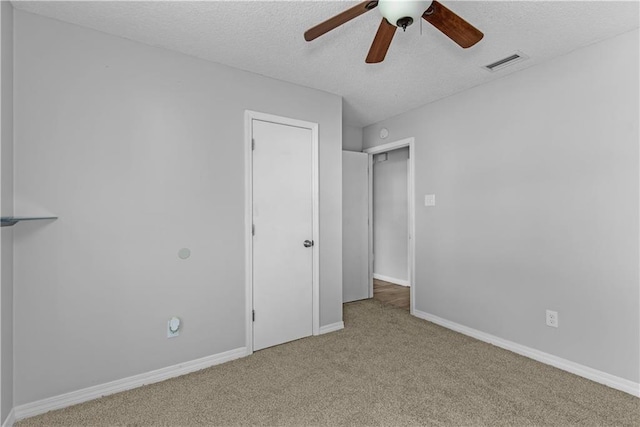 13163 Buckthorn Ct, Mobile, AL 36608 - unfurnished bedroom with carpet flooring, a textured ceiling, and ceiling fan