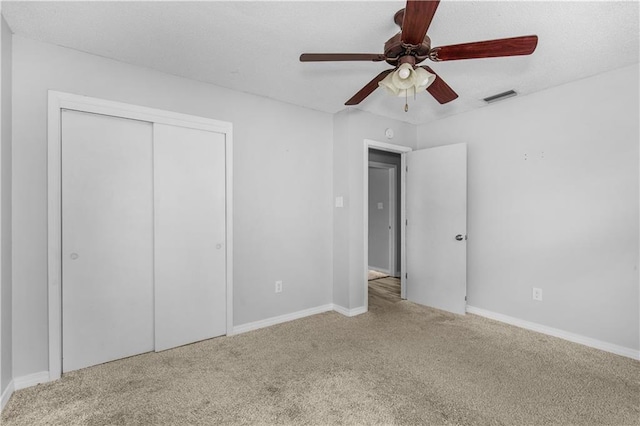 13163 Buckthorn Ct, Mobile, AL 36608 - unfurnished bedroom with carpet floors, a closet, and a ceiling fan
