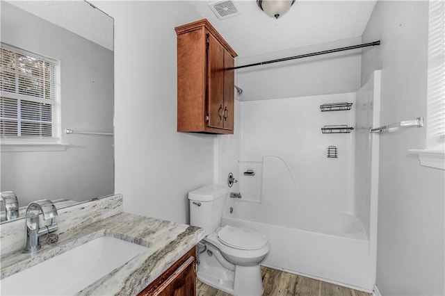 13163 Buckthorn Ct, Mobile, AL 36608 - bathroom featuring wood finished floors, vanity, and shower / bathtub combination