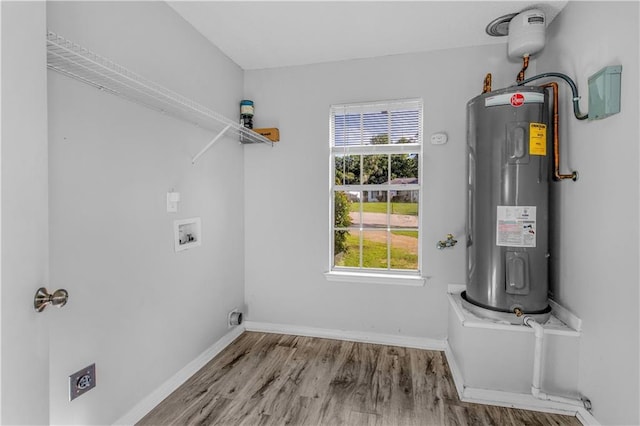 13163 Buckthorn Ct, Mobile, AL 36608 - laundry area with water heater, washer hookup, and wood finished floors