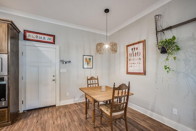 7420 Pake Rd, Saraland, AL 36571 - dining room with baseboards, dark wood-style floors, and ornamental molding