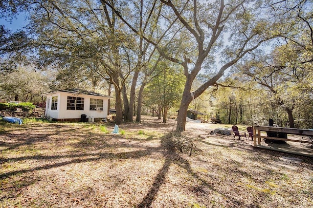 7420 Pake Rd, Saraland, AL 36571 - view of yard with an outbuilding