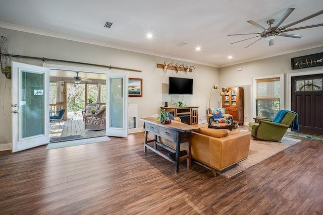 7420 Pake Rd, Saraland, AL 36571 - living room featuring visible vents, a ceiling fan, and wood finished floors