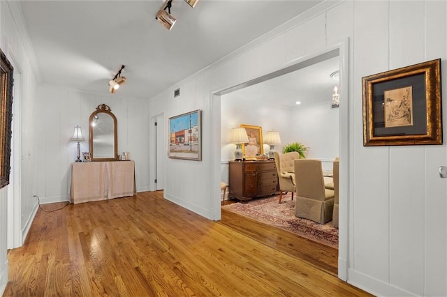 65 Byrnes Blvd, Mobile, AL 36608 - corridor featuring wood finished floors, crown molding, and baseboards