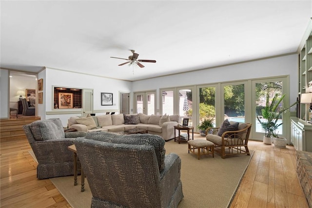 65 Byrnes Blvd, Mobile, AL 36608 - living area with a ceiling fan and light wood finished floors