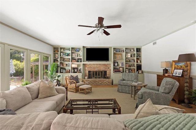 65 Byrnes Blvd, Mobile, AL 36608 - living room featuring a ceiling fan, a brick fireplace, carpet flooring, and built in shelves