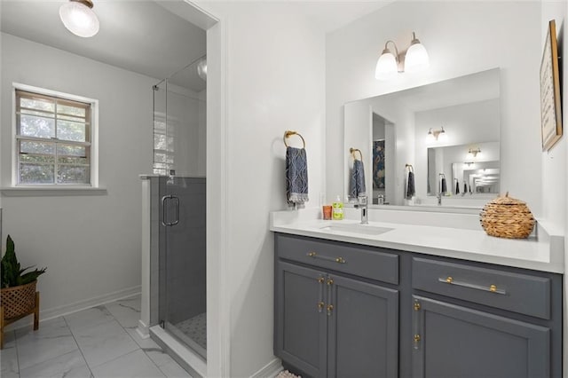 65 Byrnes Blvd, Mobile, AL 36608 - full bathroom featuring marble look tile flooring, a shower stall, vanity, and baseboards