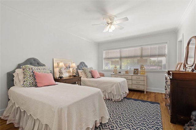 65 Byrnes Blvd, Mobile, AL 36608 - bedroom with crown molding, wood finished floors, baseboards, and a ceiling fan