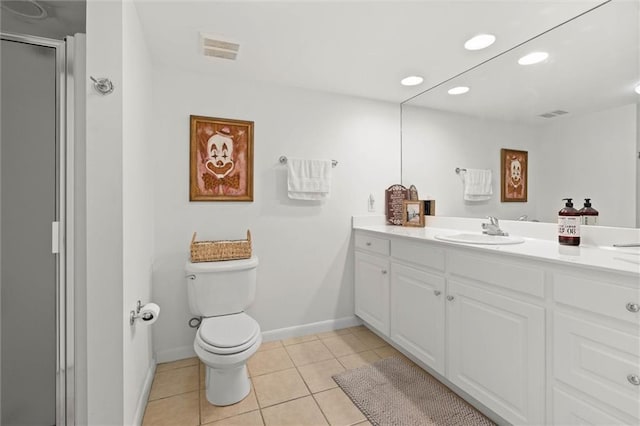 65 Byrnes Blvd, Mobile, AL 36608 - bathroom with toilet, tile patterned flooring, vanity, recessed lighting, and baseboards