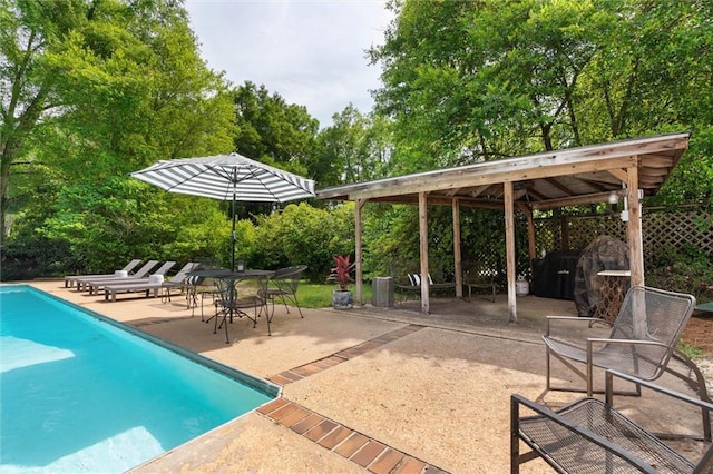65 Byrnes Blvd, Mobile, AL 36608 - swimming pool featuring a patio area, a gazebo, and view of wooded area