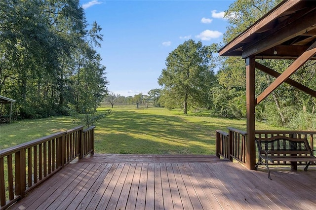 deck featuring a yard