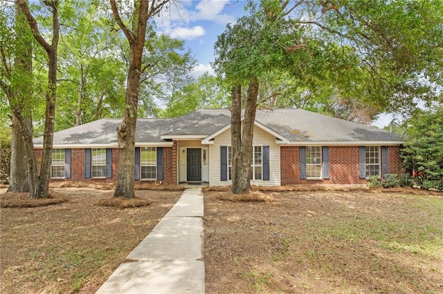ranch-style home with brick siding