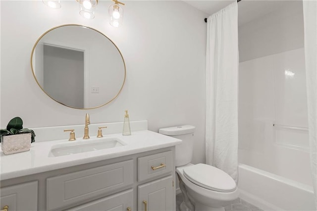 bathroom with toilet, vanity, and shower / bathtub combination with curtain