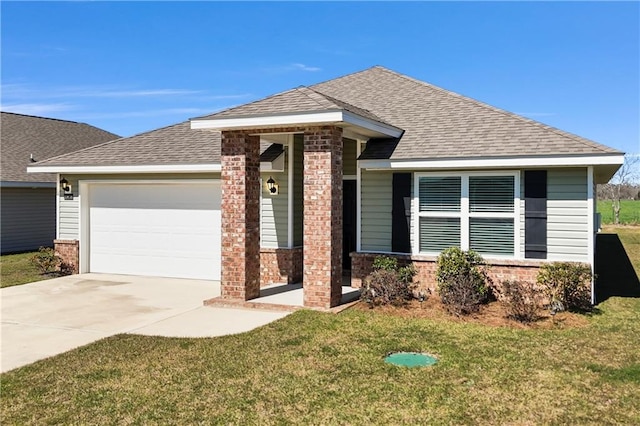 ranch-style house with an attached garage, driveway, a front yard, and roof with shingles