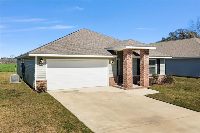 view of front of house with a shingled roof, brick siding, an attached garage, and a front lawn