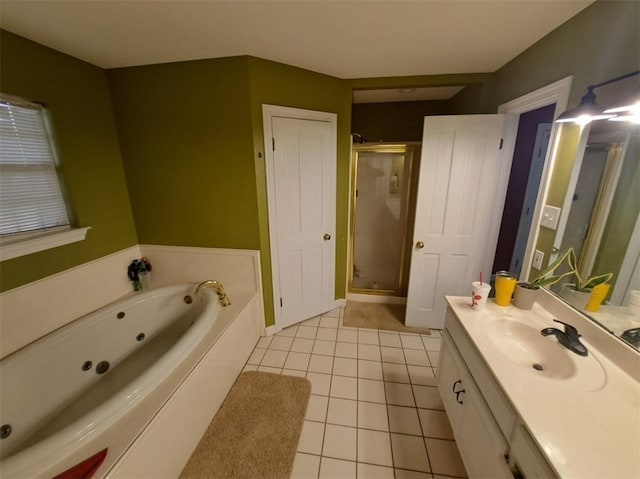 bathroom with plus walk in shower, tile patterned flooring, and vanity