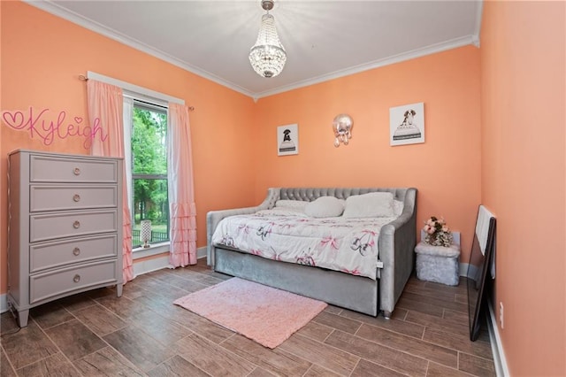 bedroom featuring baseboards, ornamental molding, and wood finished floors