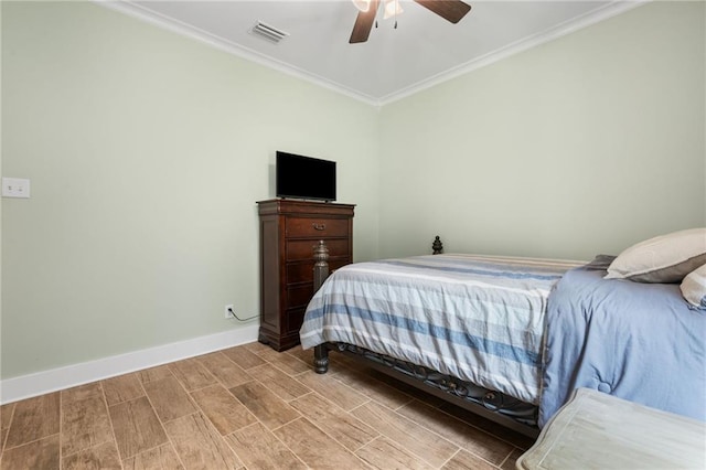 bedroom featuring visible vents, ornamental molding, baseboards, and wood tiled floor