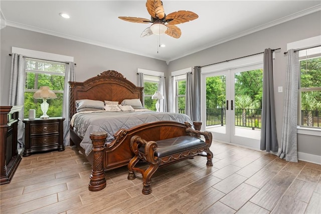 bedroom with ornamental molding, french doors, light wood finished floors, and access to exterior