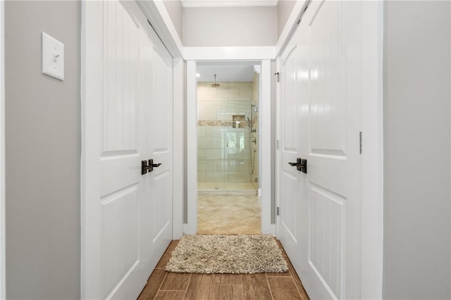 hallway featuring wood finished floors