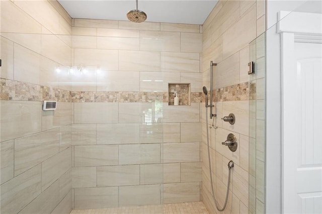 bathroom featuring a shower stall