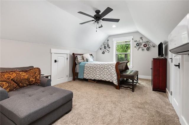 carpeted bedroom with baseboards, ceiling fan, and vaulted ceiling