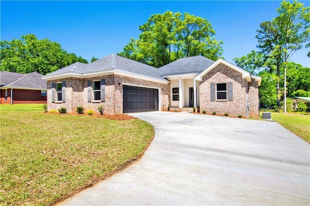 ranch-style house with an attached garage, a front lawn, driveway, and brick siding
