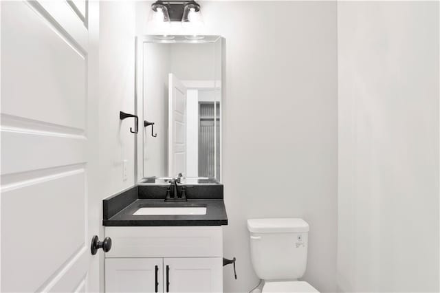 half bath with toilet and vanity