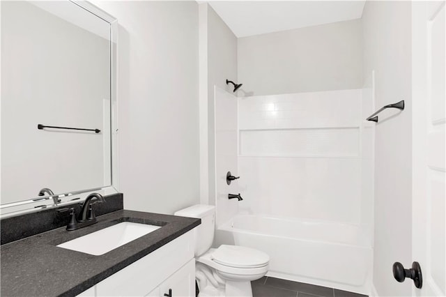 bathroom featuring shower / bathtub combination, tile patterned floors, vanity, and toilet