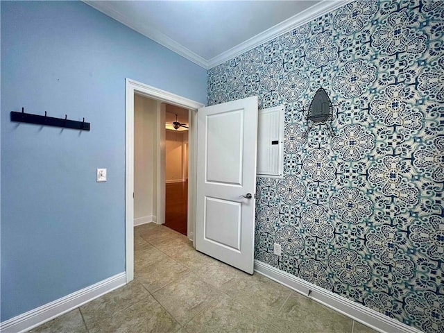 unfurnished room with electric panel, light tile patterned flooring, crown molding, and baseboards