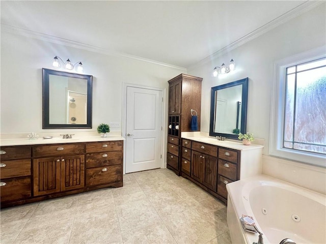 full bathroom with a jetted tub, two vanities, and a healthy amount of sunlight