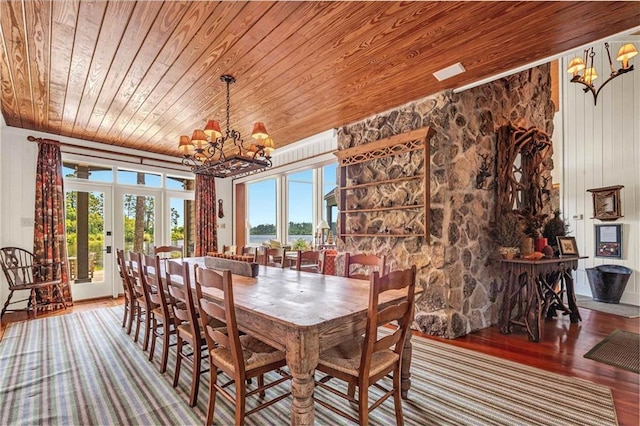 34460 Steelwood Ridge Rd, Loxley, AL 36551 - dining space featuring a chandelier, wooden ceiling, hardwood / wood-style flooring, and plenty of natural light
