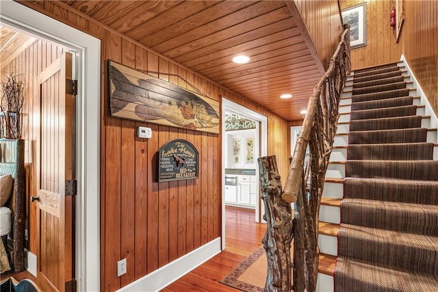 34460 Steelwood Ridge Rd, Loxley, AL 36551 - stairway with wood walls, wood ceiling, and wood finished floors