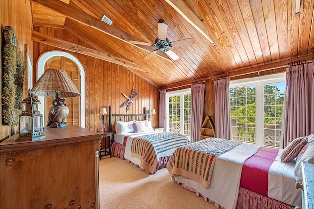 34460 Steelwood Ridge Rd, Loxley, AL 36551 - bedroom featuring wood walls, wood ceiling, vaulted ceiling, access to outside, and carpet floors