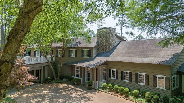 34460 Steelwood Ridge Rd, Loxley, AL 36551 - view of front of house featuring a chimney and roof with shingles