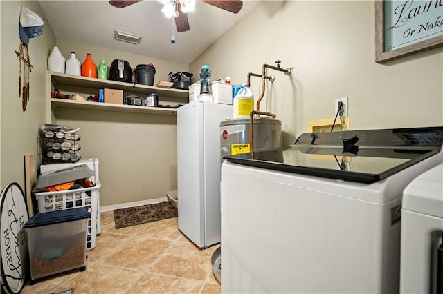 washroom with washing machine and dryer, light tile patterned flooring, and ceiling fan