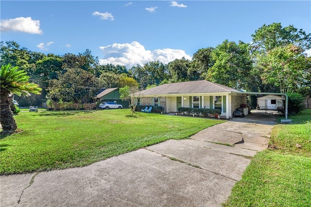 single story home with a front yard and covered porch