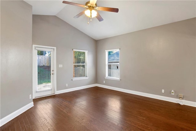 unfurnished room with dark wood-type flooring, ceiling fan, high vaulted ceiling, and baseboards