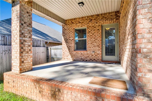 view of patio with fence