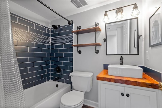 full bathroom featuring vanity, toilet, and shower / bathtub combination with curtain