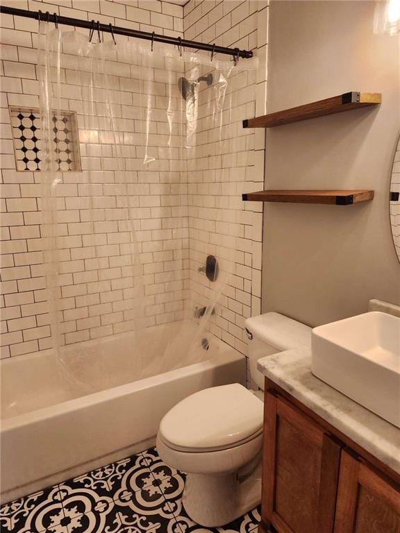 full bathroom with tile patterned floors, vanity, toilet, and shower / bathtub combination with curtain