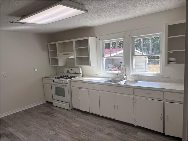 kitchen with white cabinetry, sink, dark wood-type flooring, a textured ceiling, and white gas range oven