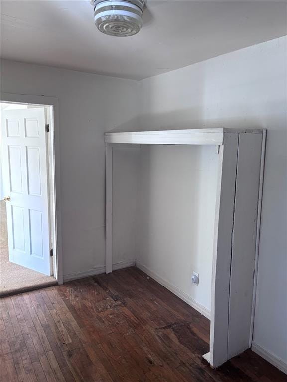 interior space with dark wood-type flooring