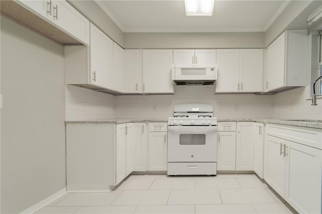 kitchen with decorative backsplash, white cabinetry, sink, and white appliances