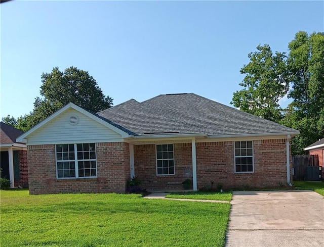 ranch-style house featuring a front lawn